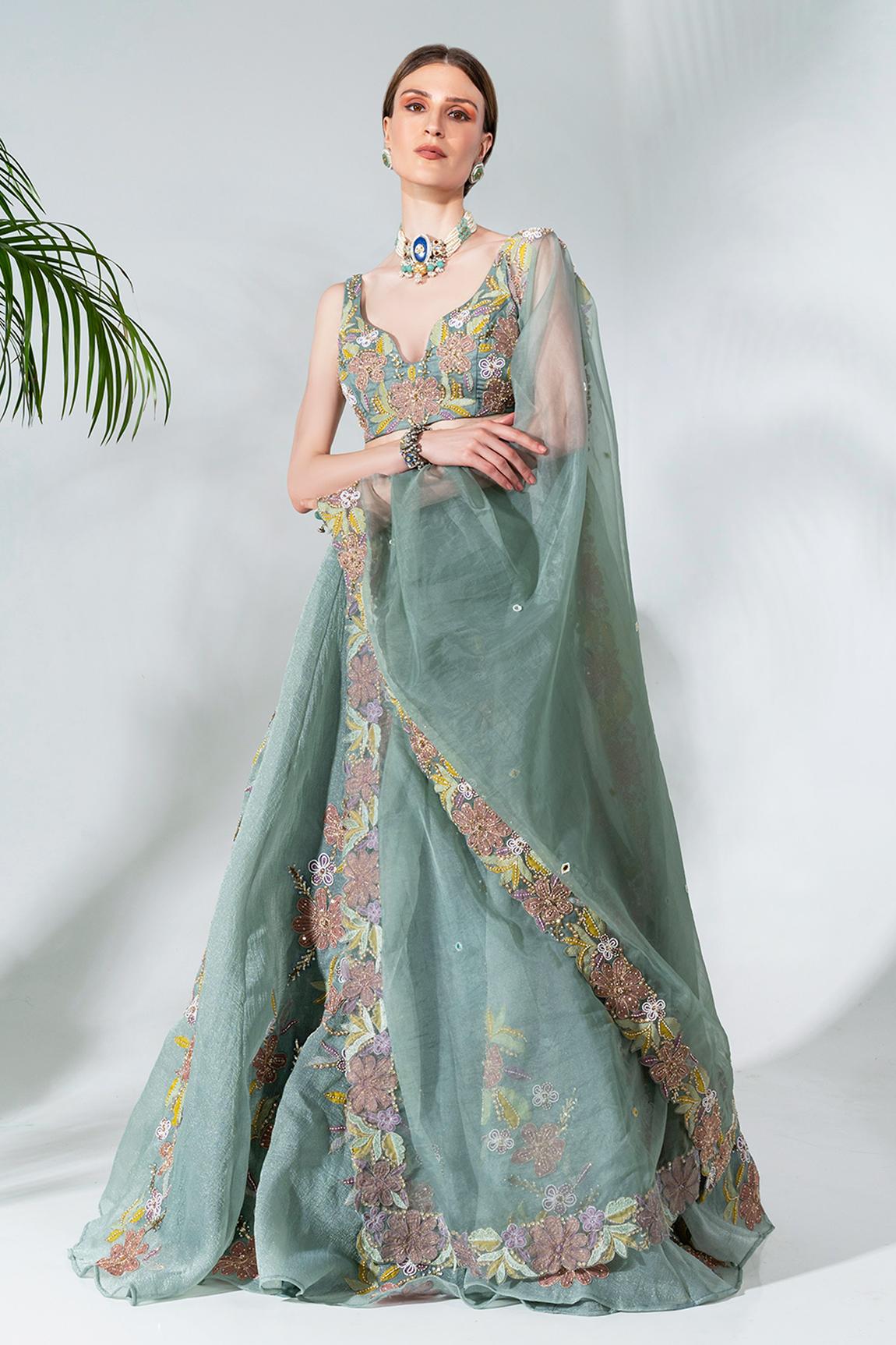 Dusty green  lehenga featuring floral applique patterns