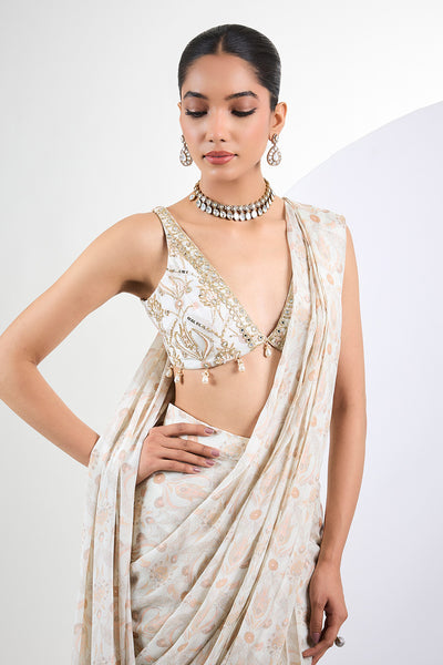 Printed chinon chiffon ivory pre draped saree with pearl tassels