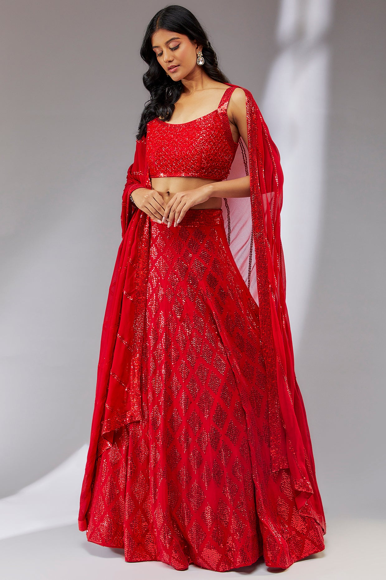 Red hand embroidered sequin lehenga set