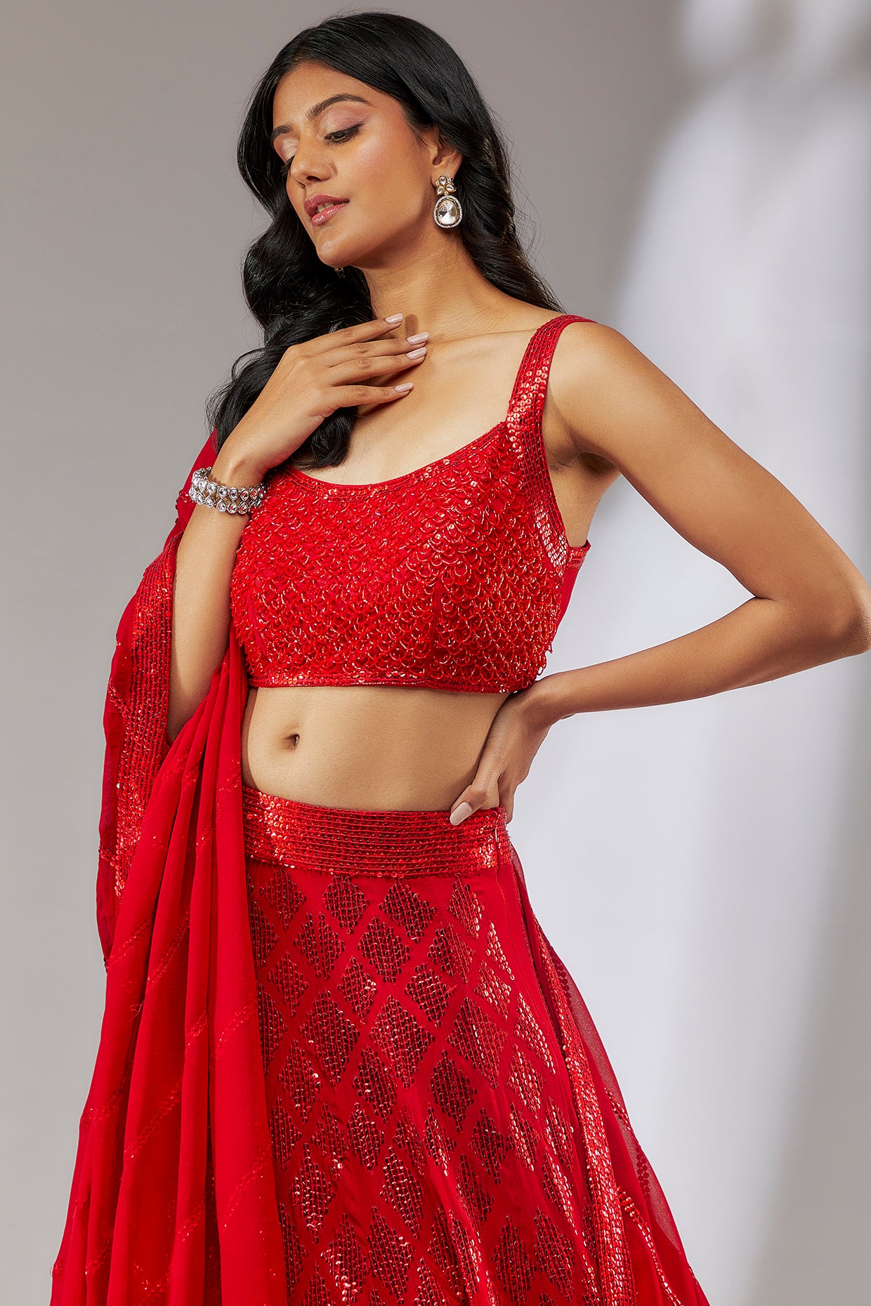 Red hand embroidered sequin lehenga set