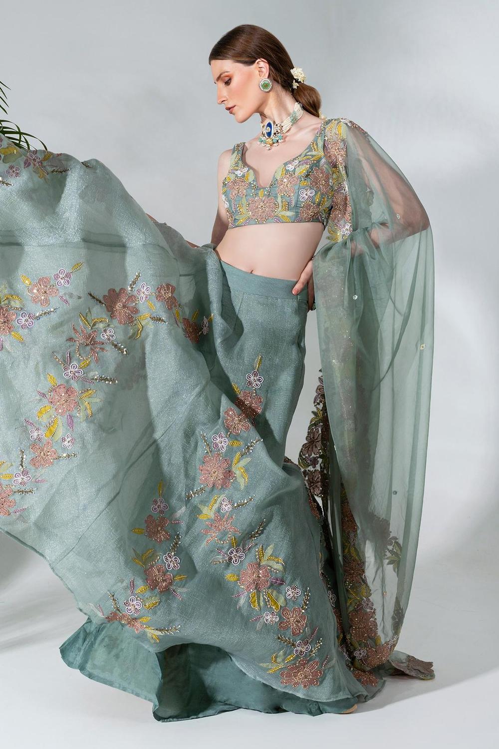 Dusty green  lehenga featuring floral applique patterns